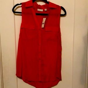 Coral/ orange summer top that’s never been worn.